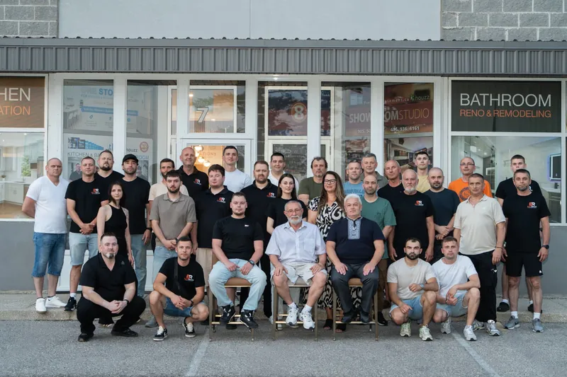 The EuroRenovations and FinishedBasement.ca team in front of the Mississauga showroom